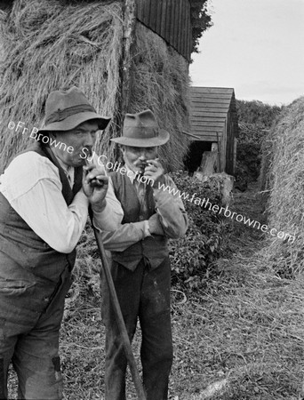 FARMERS RELAX WITH PIPES